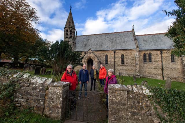 Hudswell residents outside St Michael and All Angels Church