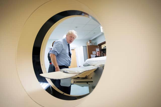 Events are taking place on November 8 to mark World Radiography Day - this was Boris Johnson seeing a scanner in actrion during a recent hospital visit.