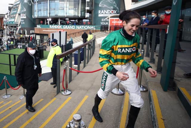 The history-making Rachael Blackmore celebrates the Randox Health Grand National win of Minella Times at Aintree in April.