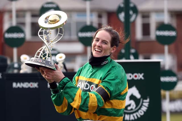 The history-making Rachael Blackmore celebrates the Randox Health Grand National win of Minella Times at Aintree in April.