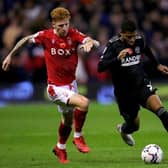 Sheffield United's Rhian Brewster, right, battles with Nottingham Forest's Jack Colback at the City Ground on Tuesday. Picture: Simon Marper/PA