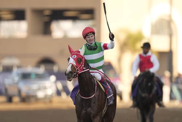 Oisin Murphy celebrates after riding Marche Lorraine to victory during the Breeders' Cup Distaff race at the Del Mar.