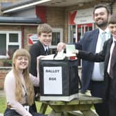 Megan Baxter, Riley Voase and Joel Cromie, students at Hornsea School and Language College, are pictured with Councillor Ben Weeks, chairman of East Riding of Yorkshire's children and young people overview and scrutiny committee.