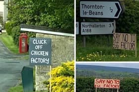 Signs protesting against the planned egg farm have been placed around the area