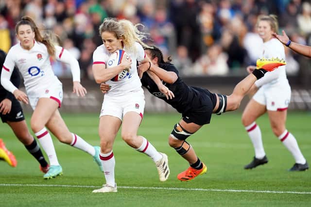 England's Abby Dow is tackled by New Zealand's Les Elder during the Autumn Internationals match at Franklin's Gardens, Northampton. (Picture: David Davies/PA)