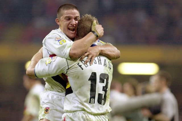 Bradford Bulls v Leeds Rhinos.
Paul Deacon and Mike Forshaw celebrate Bradford Bulls' victory over the Leeds Rhinos 22-20, in the 2003 Challenge Cup final (Picture: YPN)