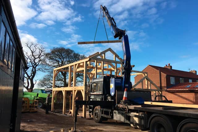 The timber frame being delivered