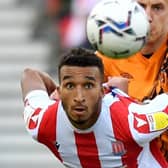 Stoke City's Jacob Brown and Hull City's Alfie Jones battle for the ball. Picture: PA