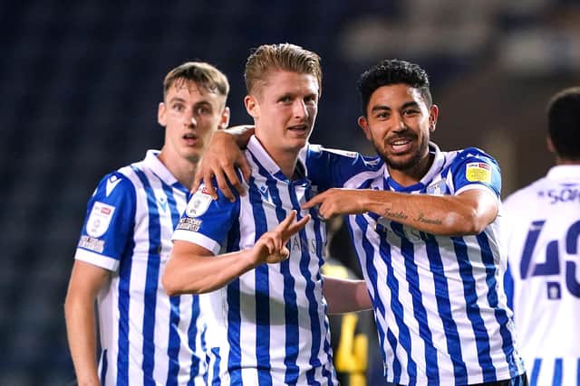 CLINICAL: George Byers (centre) celebrates with his team-mates after scoring Sheffield Wednesday's second goal of the night against Harrogate Town. Picture: PA Wire.