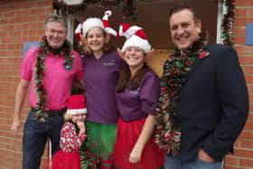 Pocklington Rugby In The Community chairman Andy Bowden, Your Hearing Consultants clinical director Lucy Cabaniuk with Sylvi, hearing care specialist Emma Flint, and Pocklington RUFC president Paul Rhodes.
