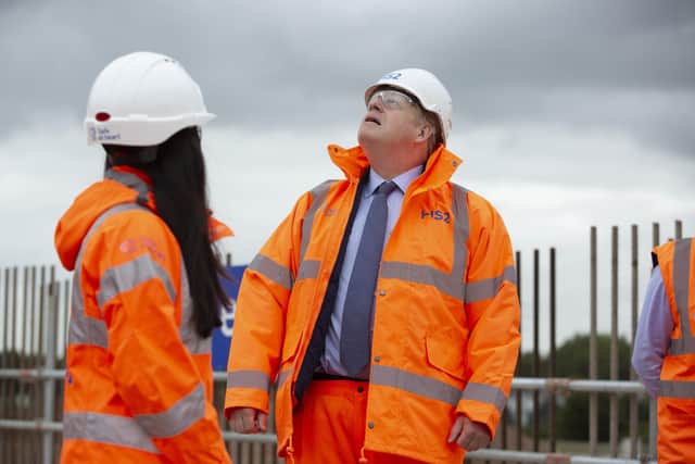 Prime Minister Boris Johnson uring a visit to a HS2 construction site last year.
