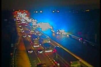 A fire and multi vehicle collision has shut the M62 near Lofthouse in both directions. Picture: Highways England.