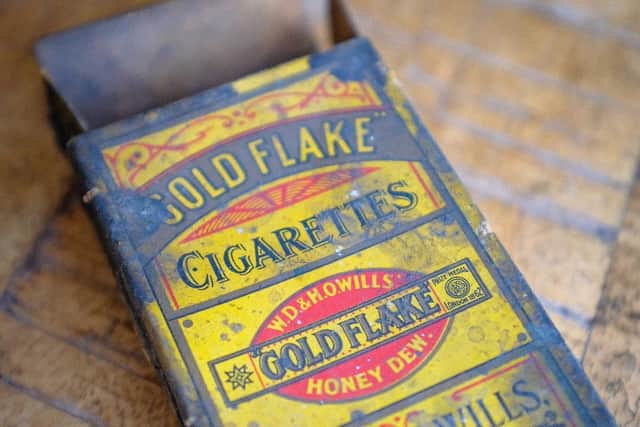 Cigarette packets are among the debris discovered under the cinema's floorboards