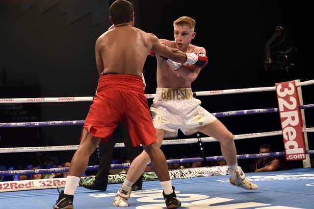 Jack Bateson tussles with Bayardo Ramos at the First Direct Leeds Arena in June 2019 Picture: Steve Riding.