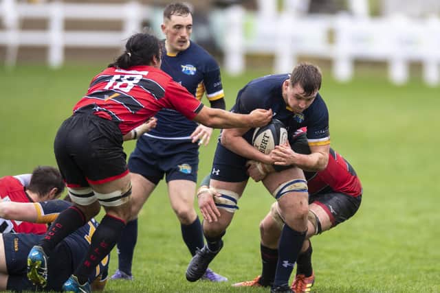 Leeds Tykes' Tom Collins is tackled by the Blackheath defence.  Picture: Tony Johnson.
