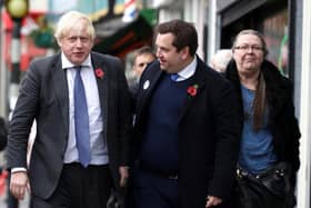 Prime Minister Boris Johnson arrives to visit a coronavirus vaccination centre at a pharmacy in Sidcup, during a visit to the Old Bexley and Sidcup constituency head of a by-election next month following the death of the sitting member, James Brokenshire. Picture: PA