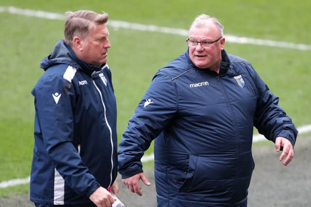 TOUGH OPPONENT: Gillingham assistant manager Paul Raynor (left) and manager Steve Evans  Picture: Richard Sellers/PA
