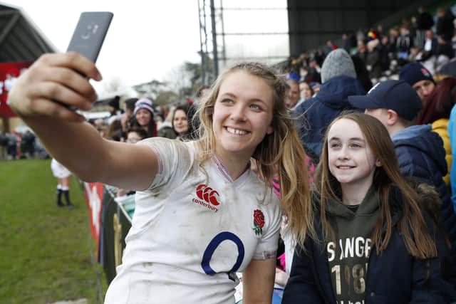 INSPIRING A GENERATION: Zoe Aldcroft takes a picture with a young fan. Picture: Getty Images.
