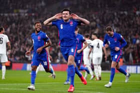 England's Harry Maguire celebrates scoring their side's first goal of the World Cup qualifier with Albania (Picture: PA)