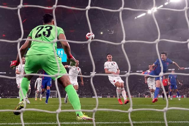Heads you win: England's Harry Maguire scores their side's first goal (Picture: PA)