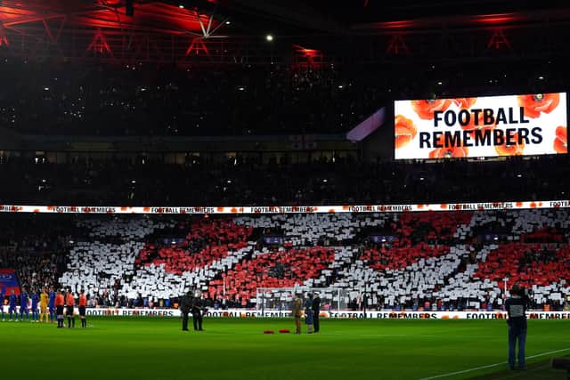 General view as both teams and the fans observe a silence for Remembrance Day during the FIFA World Cup Qualifying match at Wembley Stadium, London. (Picture: PA)