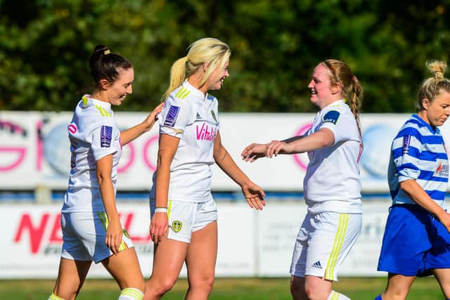 Leeds United's Laura Bartup, (centre) celebrates scoring a goal, with teammates Jodie Hunter, left, and right Hannah Freibach. (Picture: James Hardisty)