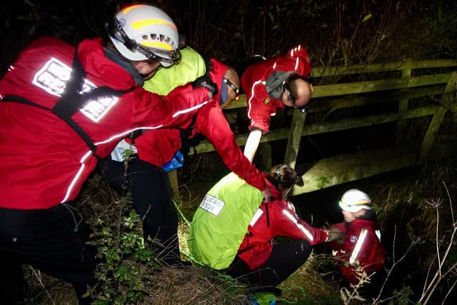 The team working together during the rescue (Pic: Scarborough and Ryedale Mountain Rescue team/Facebook)