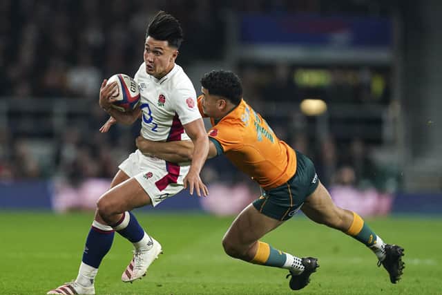 Australia's Hunter Paisami (right) tackles England's Marcus Smith (left) during the Autumn International (Picture: PA)