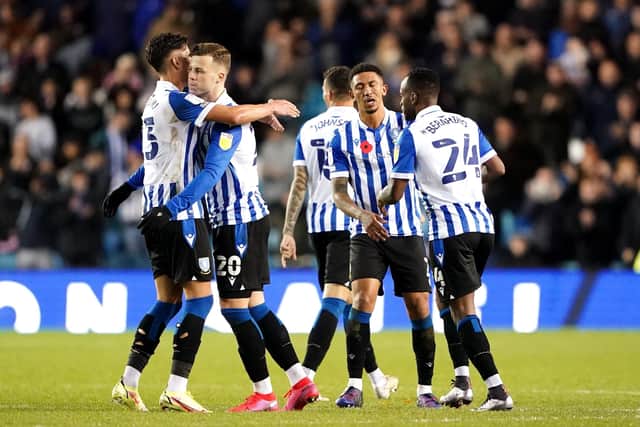 Sheffield Wednesday's Florian Kamberi (second left) celebrates scoring the Owls' equaliser against Gillingham at Hillsborough. Picture: Zac Goodwin/PA