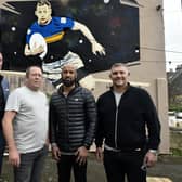 Rob Burrow mural launch at the Bay Horse Pub in Meanwood, Leeds. Pictured are Bay Horse regular Richard Sheridan who organised the mural,lLandlord Glen Barraclough and former team mates Jamie Jones Buchanan and  Barrie McDermott attended by a large crowd of regulars and Rhinos fans.