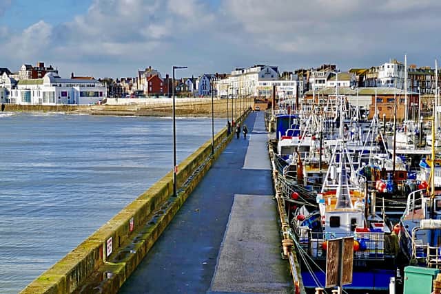 A modern day photograph showing the busy Bridlington harbour area.