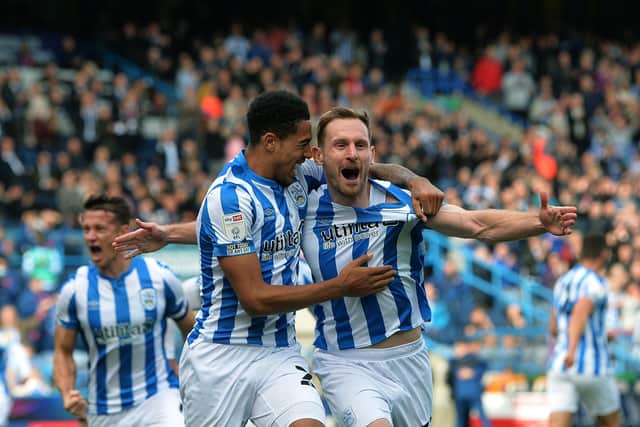 Huddersfield's Tom Lees celebrates opening the scoring against Hull City with Levi Colwill on 16th October 2021.
(Picture: Jonathan Gawthorpe)