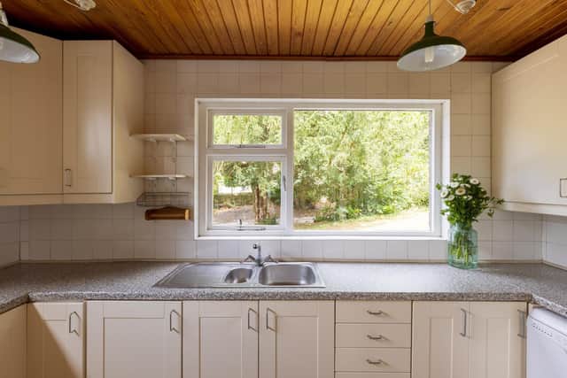 The kitchen is one of the few later additions done after David Mellor sold the property