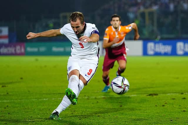 England's Harry Kane (left) scores his side's fifth goal of the game against San Marino from the penalty spot . Picture: Nick Potts/PA
