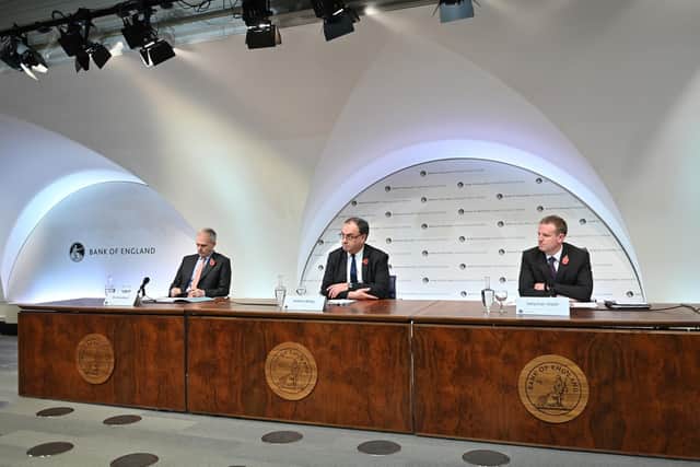 (Left-right) Deputy Governor for Monetary Policy Ben Broadbent, Governor of the Bank of England Andrew Bailey and Chief Press Officer Sebastian Walsh during the Bank of England Monetary Policy Report Press Conference at the Bank of England.