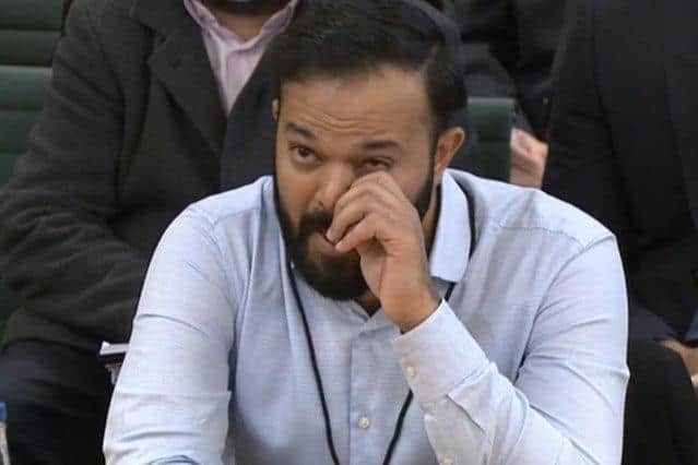 Screen grab from Parliament TV of former cricketer Azeem Rafiq crying as he gives evidence at the inquiry into racism he suffered at Yorkshire County Cricket Club, at the Digital, Culture, Media and Sport (DCMS) committee (Parliament TV).