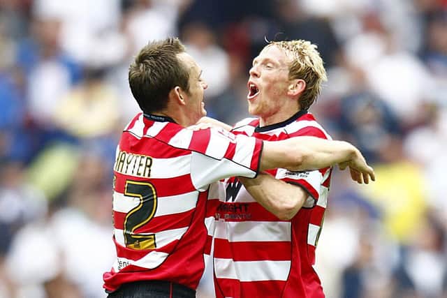 Doncaster Rovers' Paul Green (right) and James Hayter celebrate after the final whistle during the Coca-Cola League One Play Off Final against Leeds United at Wembley Stadium, London. (Picture: PA)