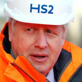 File photo dated 11/02/20 of Prime Minister Boris Johnson during a visit to Curzon Street railway station in Birmingham where the HS2 rail project is under construction (PA)