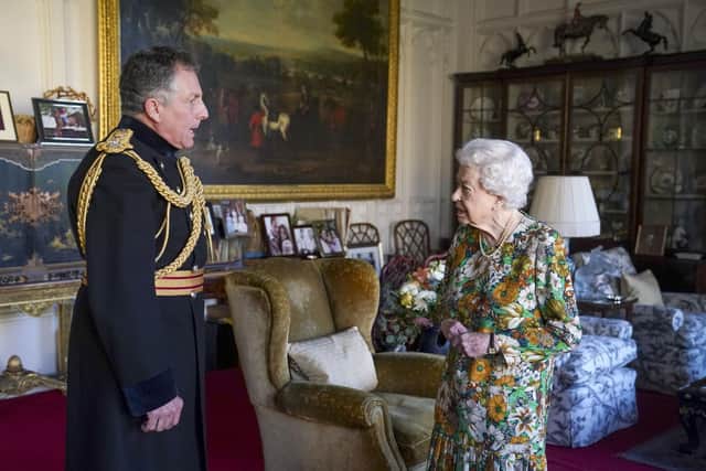 Queen Elizabeth II receives General Sir Nick Carter, Chief of the Defence Staff, during an audience in the Oak Room at Windsor Castle, Berkshire.