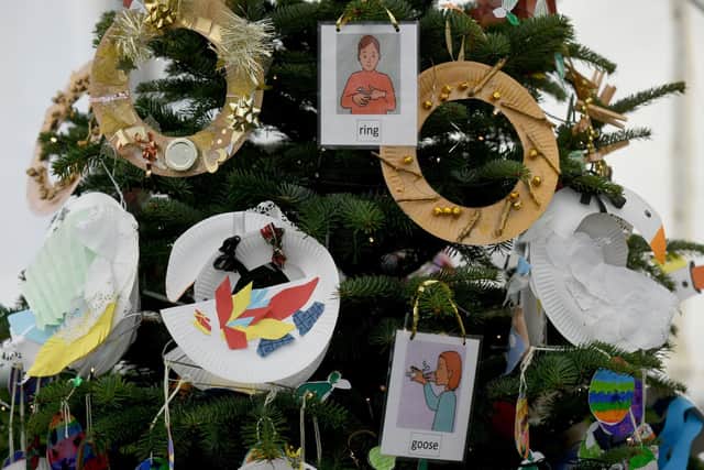 Decorations on the Hempland Primary School Christmas Tree from York, at the York Minster Christmas Tree Festival. Writer: Byline: Gary Longbottom