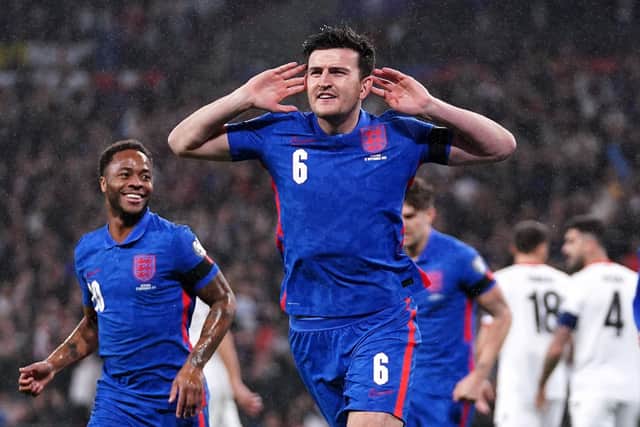 England's Harry Maguire put his fingers in ears to silence the doubters after scoring against Albania (PIcture: PA)