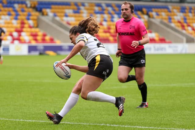 York's Savannah Andrade runs in for a try against Castleford at the LNER Stadium in May (Picture: SWPix.com)