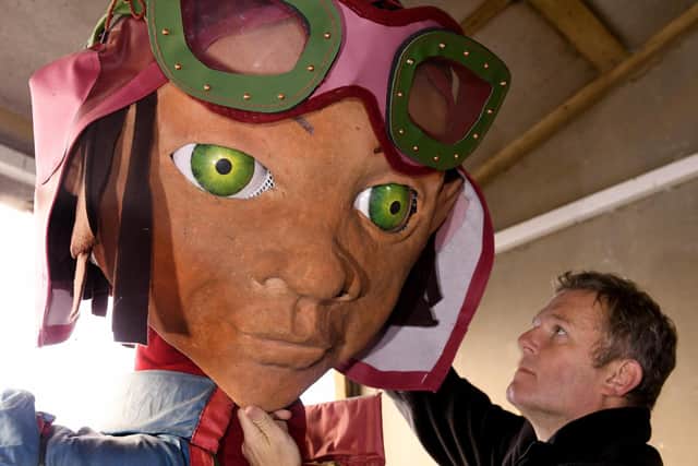 Lee Threadgold working on giant puppet heads to be used in The Odyssey. (Gary Longbottom).
