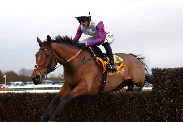 Bravemansgame ridden by jockey Harry Cobden on their way to winning the Double Daily Rewards With Betfair Graduation Chase during the Betfair Chase Day at Haydock Park Racecourse.