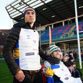 FINISH LINE: Kevin Sinfield stands with Rob Burrow after completing his Extra Mile challenge. Picture: PA Wire.