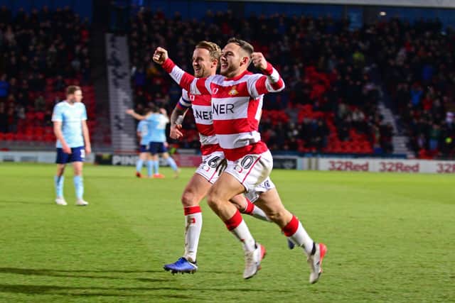 GOOD TIMES: Jon Taylor, right, celebrates his goal with Doncaster Rovers' team-mate James Coppinger against Accrington Stanley in December 2019. Picture: Marie Caley.