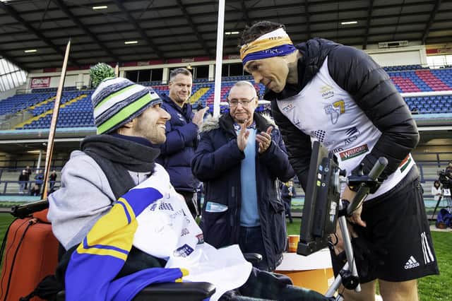 AMAZING: Kevin Sinfield meets Rob Burrow at the finish line after completing his Extra Mile Challenge of 101 miles in 24 hours. Picture by Allan McKenzie/SWpix.com