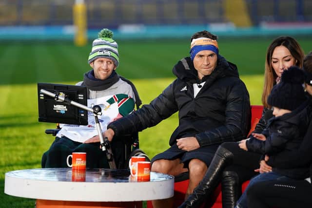 Kevin Sinfield, with Rob Burrow (left), is interviewed at Headingley Stadum after completing the Extra Mile Challenge from Leicester to Leeds. Picture: Zac Goodwin/PA