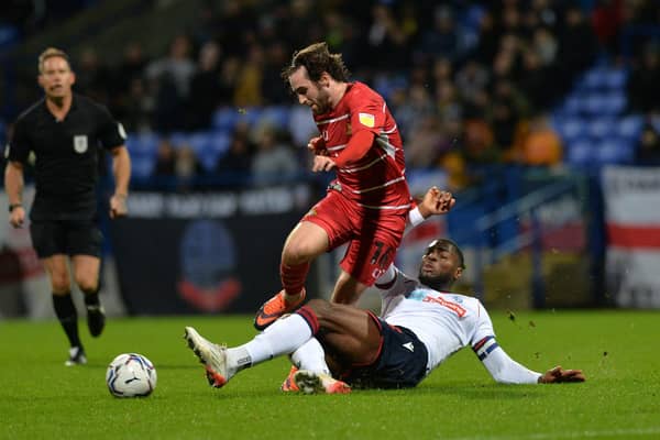 Doncaster's Aidan Barlow is tackled by Bolton's Ricardo Almeida Santos.
(
Picture: Jonathan Gawthorpe)