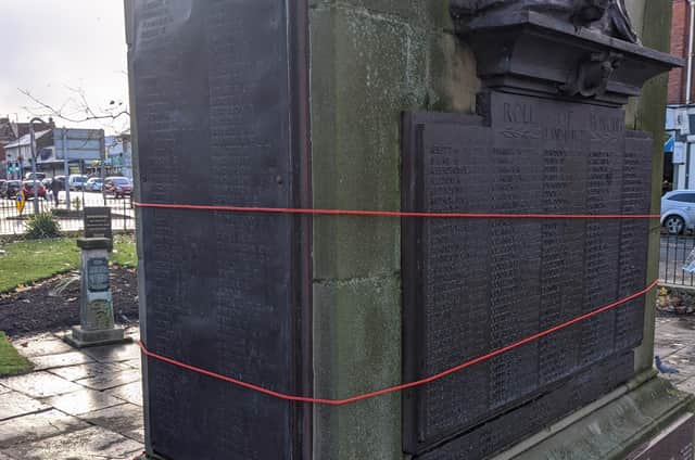 The war memorial has now been repaired after residents used rope to secure a bronze plaque on the momument.